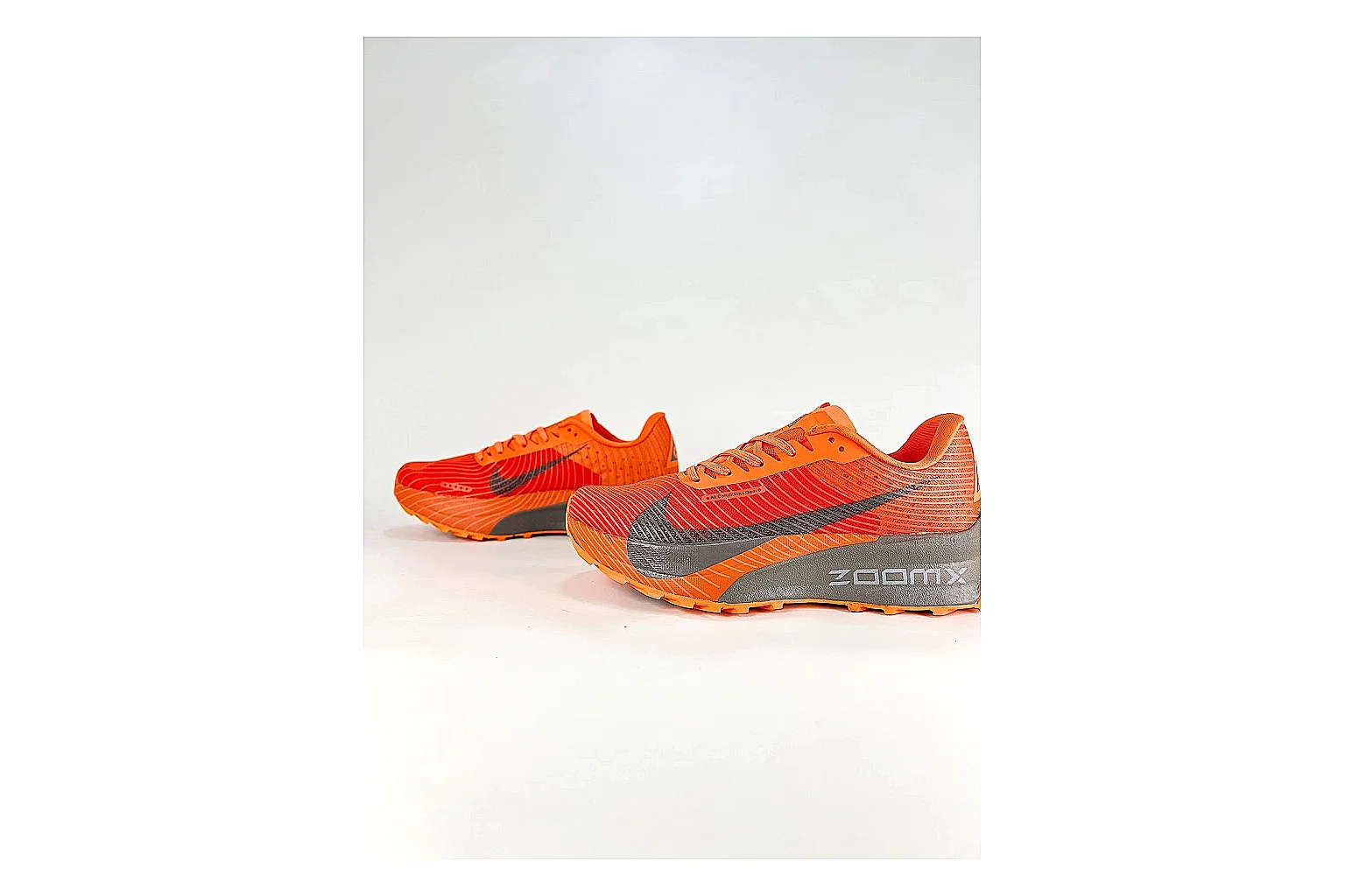 Nike ACG Ultra Orange Gray Sneakers shopping brief image showing orange gray outdoor sneakers with textile texture, side-profile shape, upper panel lines, and outsole detail thumbnail 3