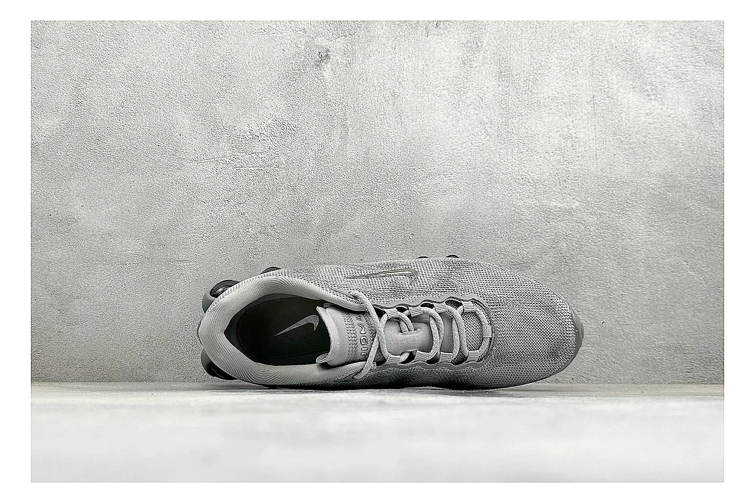 Nike Air Liquid Metal Silver shopping brief image showing reflective silver upper, running-inspired panels, sculpted pod outsole, and glossy tech finish thumbnail 5