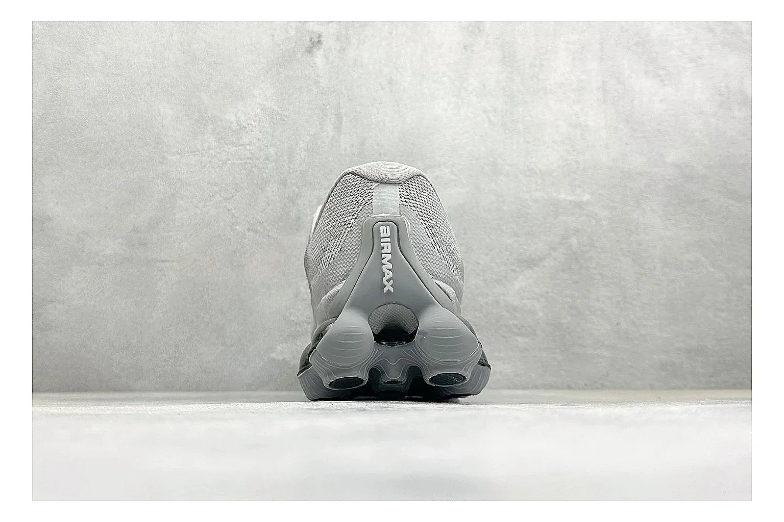 Nike Air Liquid Metal Silver shopping brief image showing reflective silver upper, running-inspired panels, sculpted pod outsole, and glossy tech finish thumbnail 6