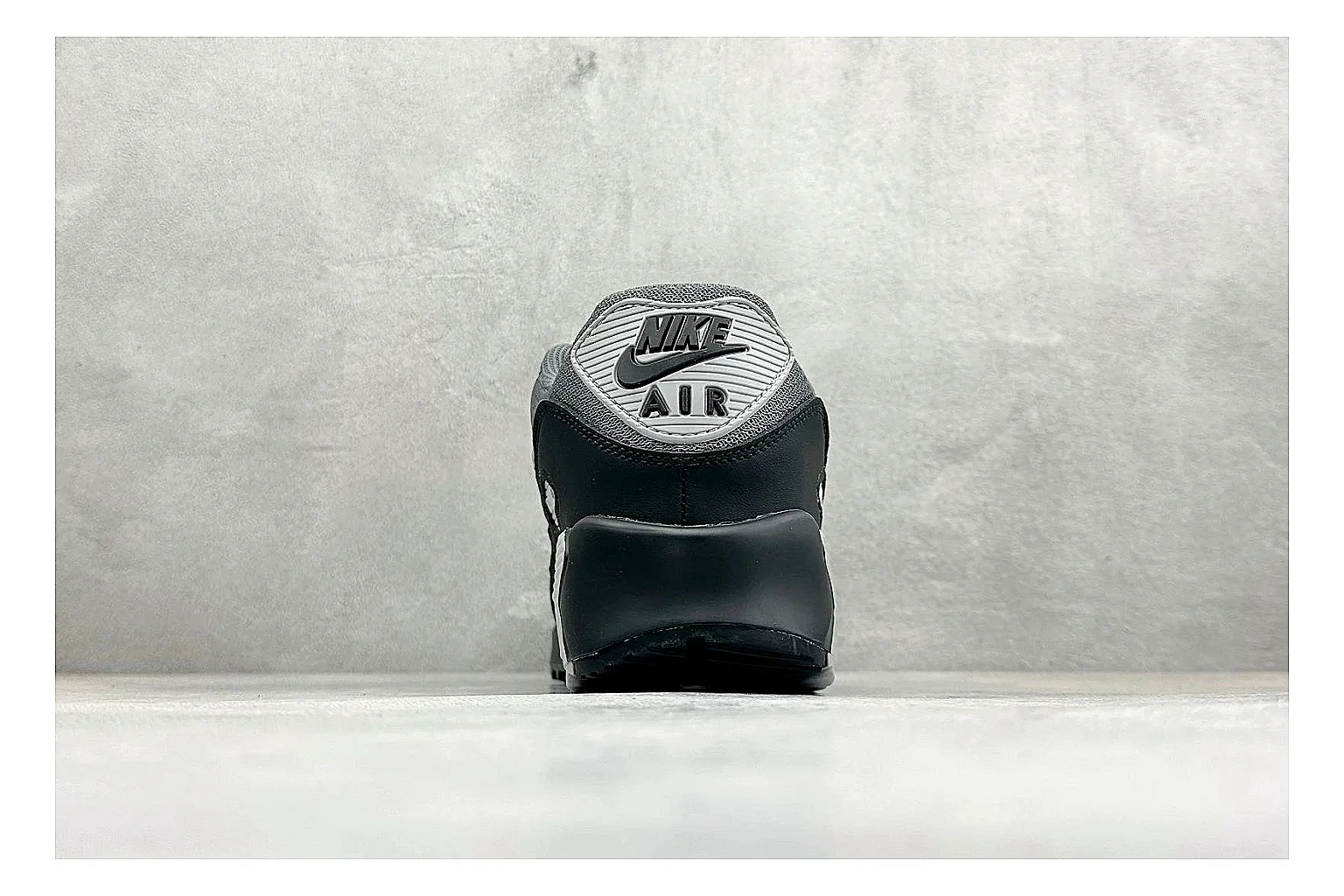 Nike Air Max 90 Grey Black shopping brief photo showing grey and black layered upper, visible Air window, classic Air Max 90 panels, and sturdy retro sole thumbnail 6