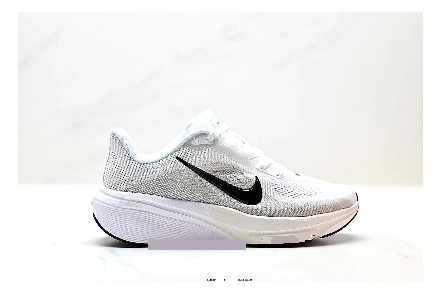 Nike Air Zoom Pegasus White Pink Sneakers shopping brief image showing white pink running sneakers with mesh texture, side-profile shape, upper panel lines, and outsole detail