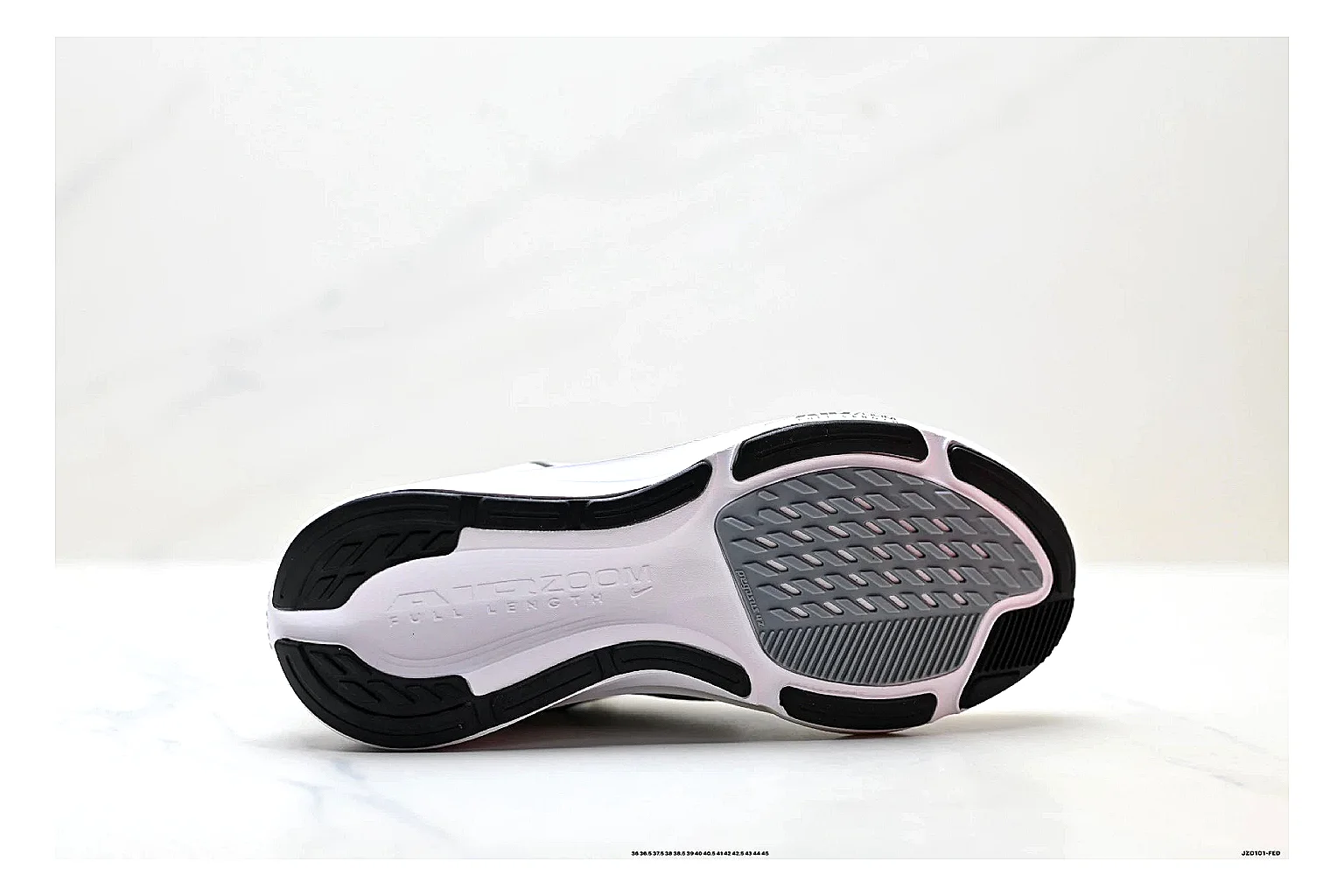 Nike Air Zoom Pegasus White Pink Sneakers shopping brief image showing white pink running sneakers with mesh texture, side-profile shape, upper panel lines, and outsole detail thumbnail 2