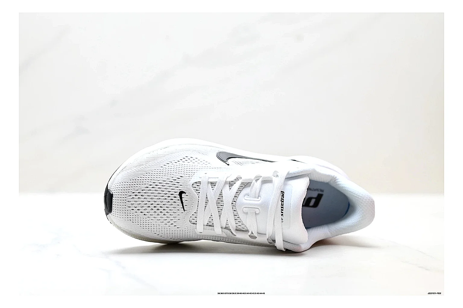 Nike Air Zoom Pegasus White Pink Sneakers shopping brief image showing white pink running sneakers with mesh texture, side-profile shape, upper panel lines, and outsole detail thumbnail 5