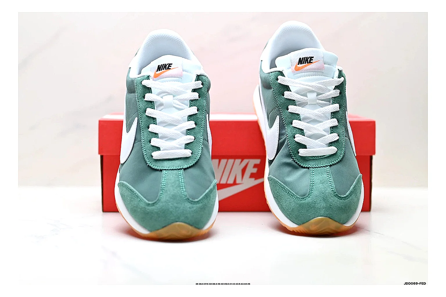 Nike Cortez Green White shopping brief photo showing green white leather low-top upper, slim retro runner profile, Swoosh detail, and classic Cortez sole thumbnail 3