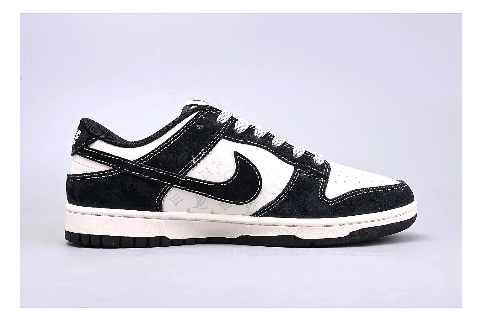 Nike Dunk Low Black White shopping brief photo showing black and white leather panels, low Dunk silhouette, padded collar, and basketball-retro sole thumbnail 4