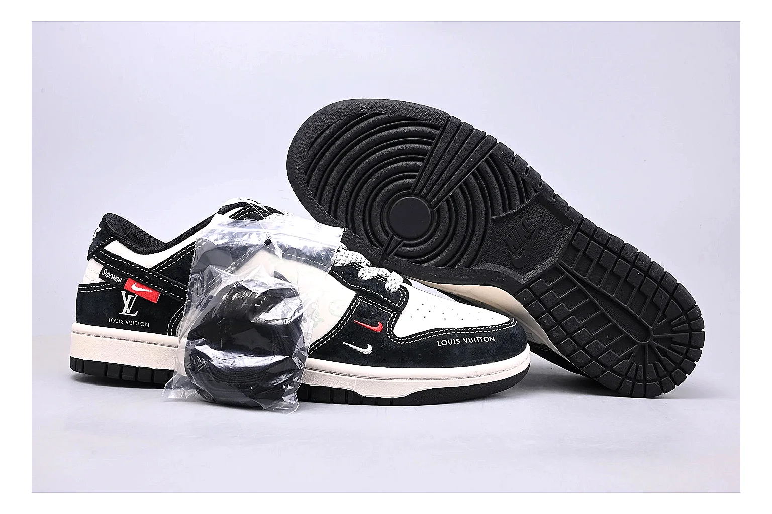 Nike Dunk Low Black White shopping brief photo showing black and white leather panels, low Dunk silhouette, padded collar, and basketball-retro sole thumbnail 6