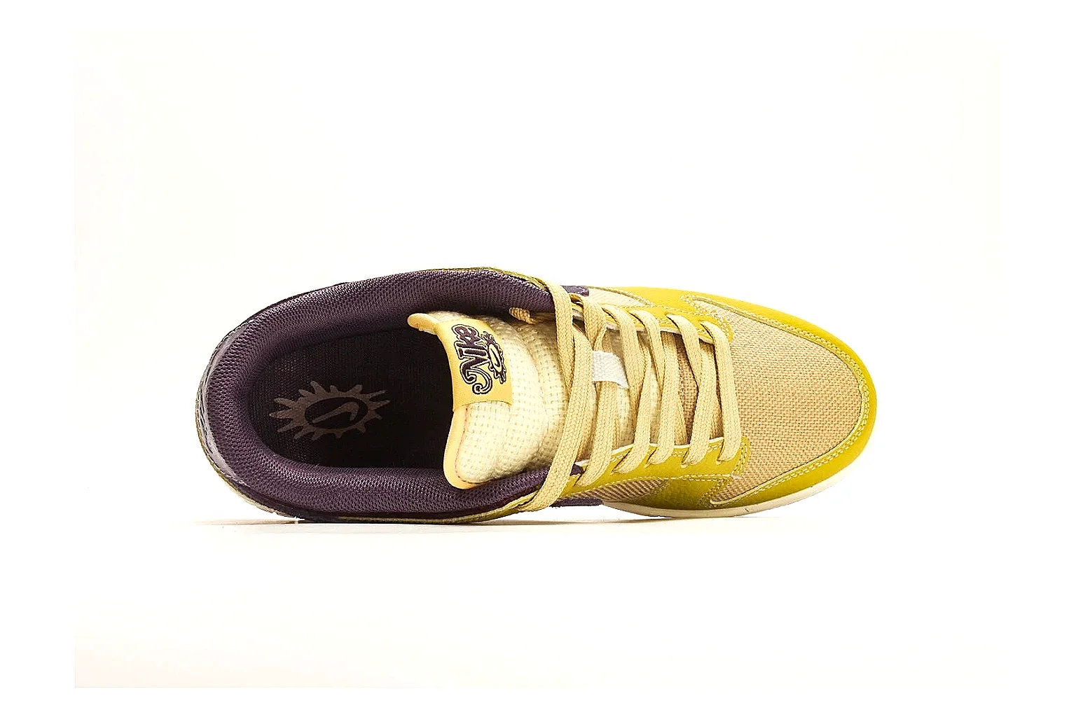 Nike Dunk Low Yellow Purple shopping brief photo showing yellow and purple leather panels, dark Swoosh, heel overlay, cream midsole, and brown outsole thumbnail 5