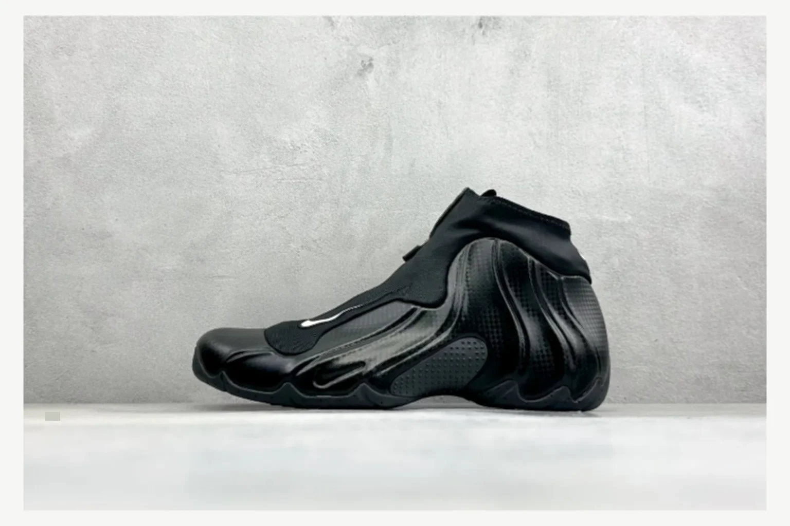 Nike Air Foamposite Black Mid Top shopping brief image SKU 1182167379