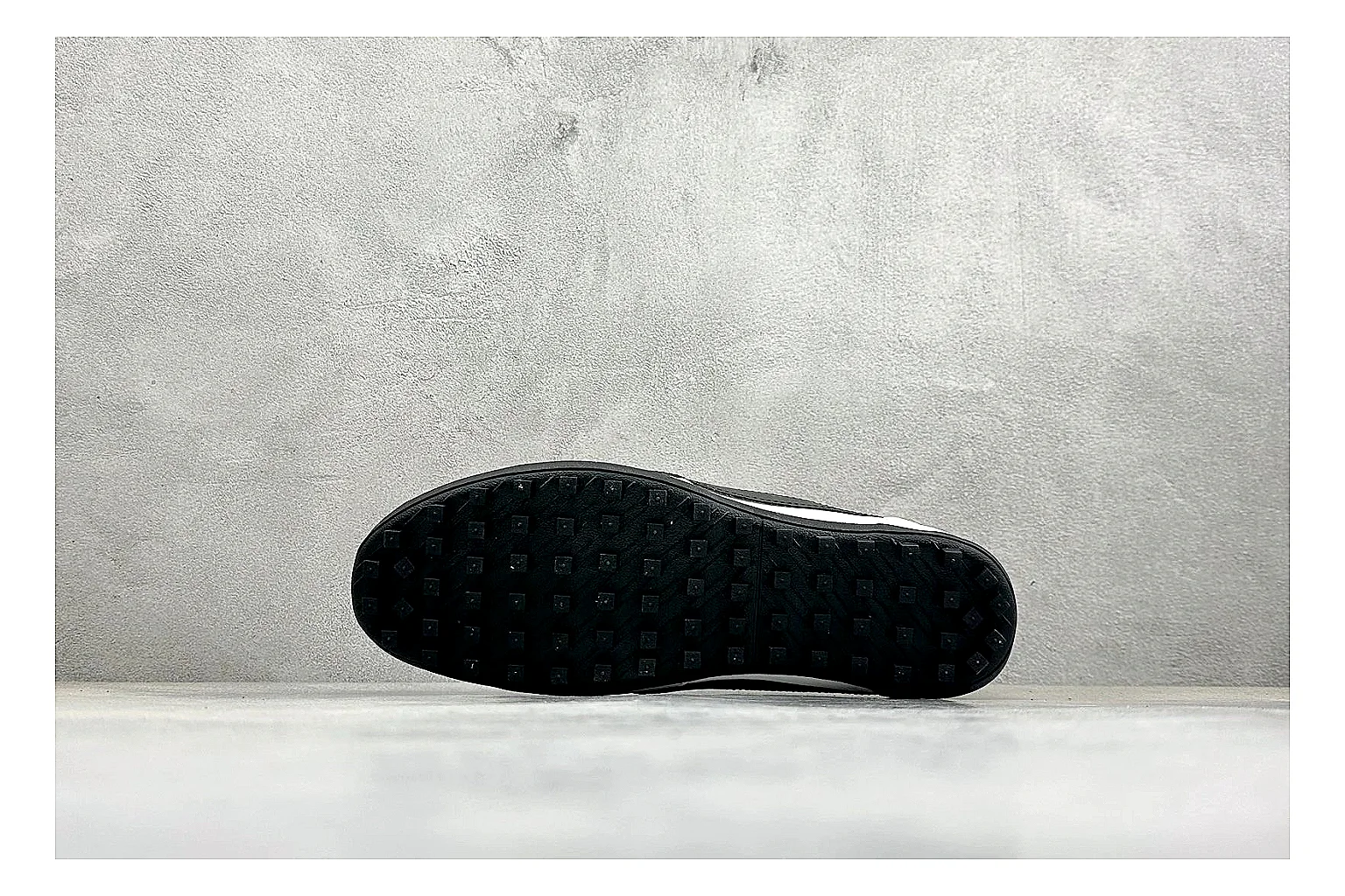 Nike Moon Shoe OG White Black shopping brief image showing white upper, black Swoosh, slim retro runner shape, and waffle-style outsole thumbnail 2