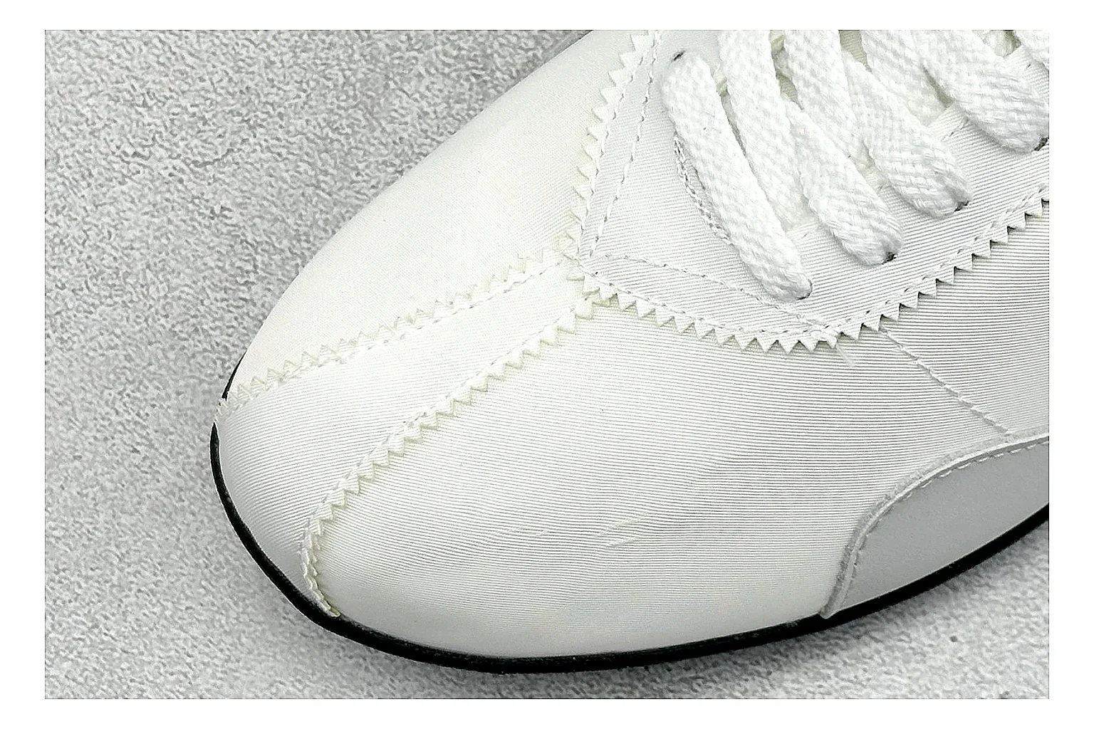 Nike Moon Shoe OG White Black shopping brief image showing white upper, black Swoosh, slim retro runner shape, and waffle-style outsole thumbnail 3