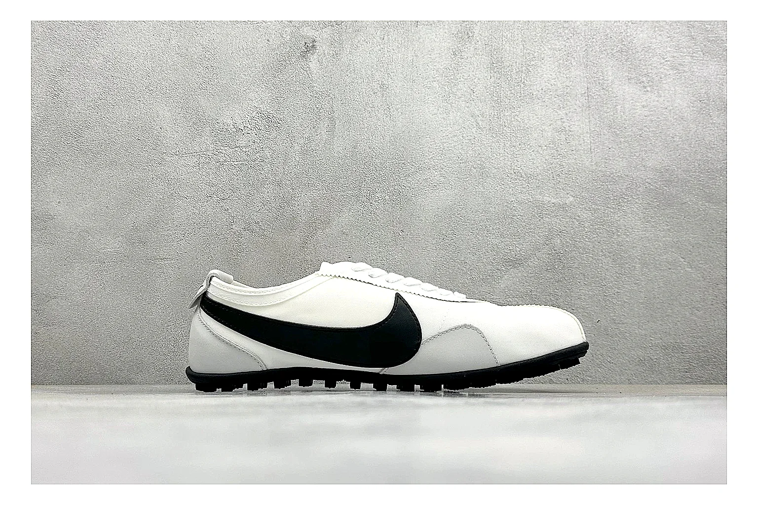 Nike Moon Shoe OG White Black shopping brief image showing white upper, black Swoosh, slim retro runner shape, and waffle-style outsole thumbnail 4