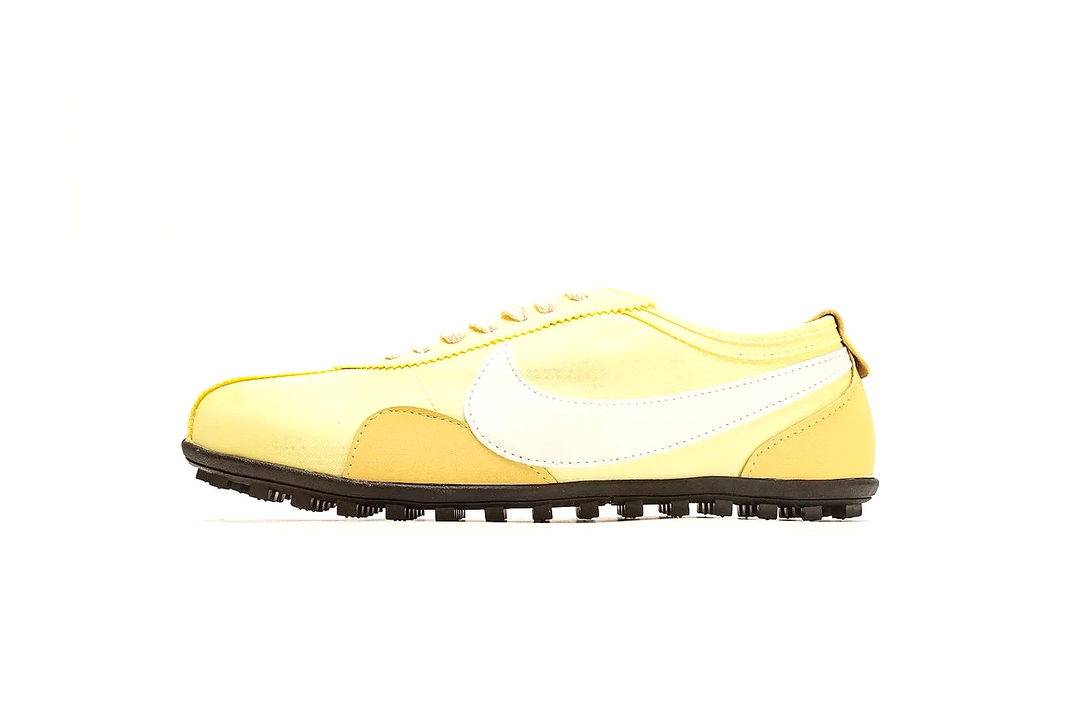 Nike Moon Yellow Retro Runner shopping brief photo showing yellow slim runner upper, white Swoosh, low retro profile, white midsole, and black waffle outsole