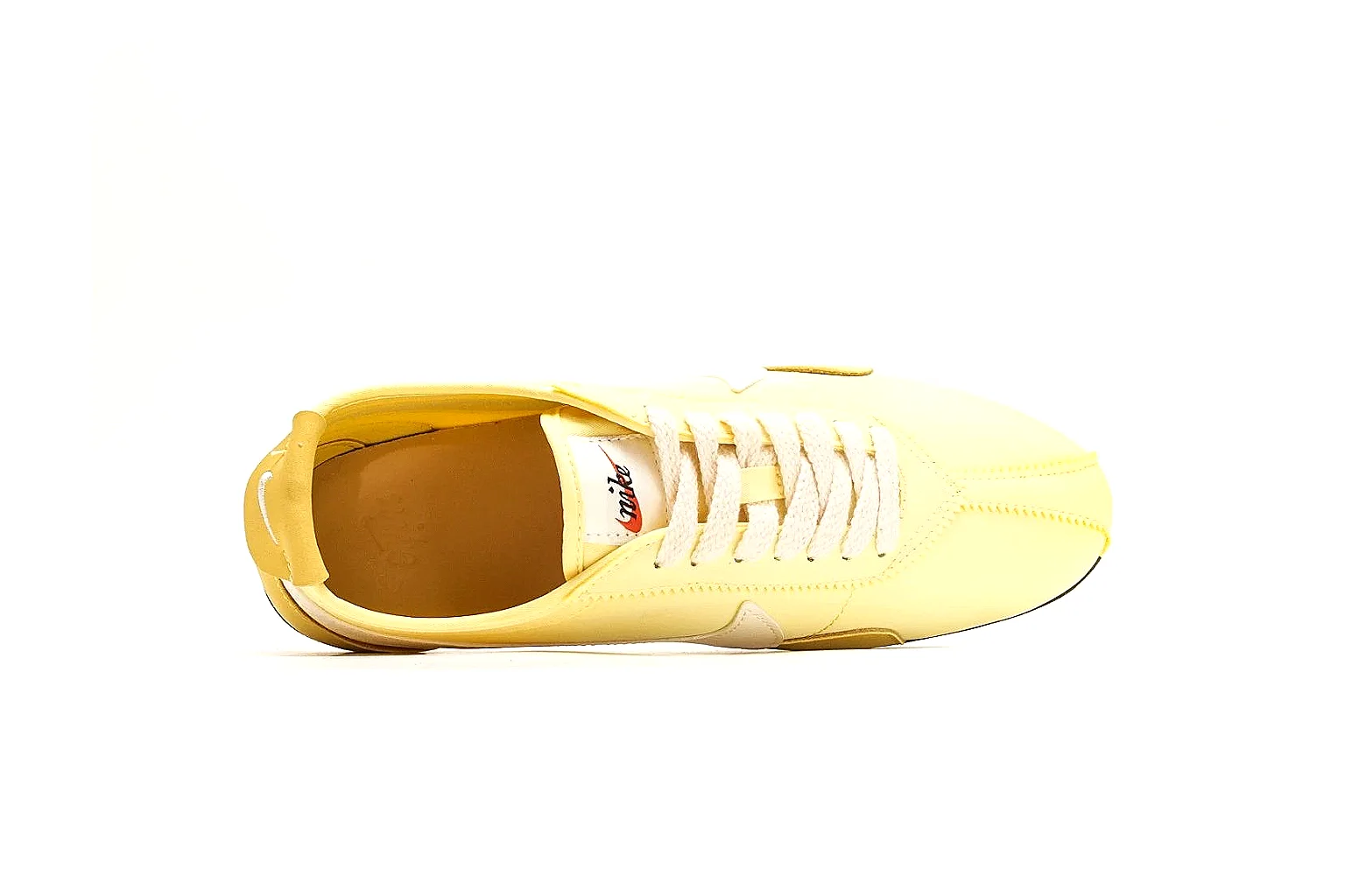Nike Moon Yellow Retro Runner shopping brief photo showing yellow slim runner upper, white Swoosh, low retro profile, white midsole, and black waffle outsole thumbnail 5