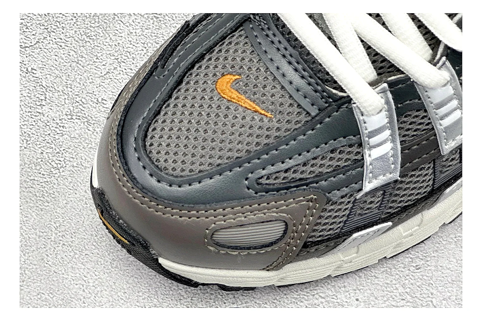 Nike P-6000 Black Orange shopping brief photo showing black layered runner upper, orange accent hits, retro P-6000 paneling, and cushioned casual sole thumbnail 3