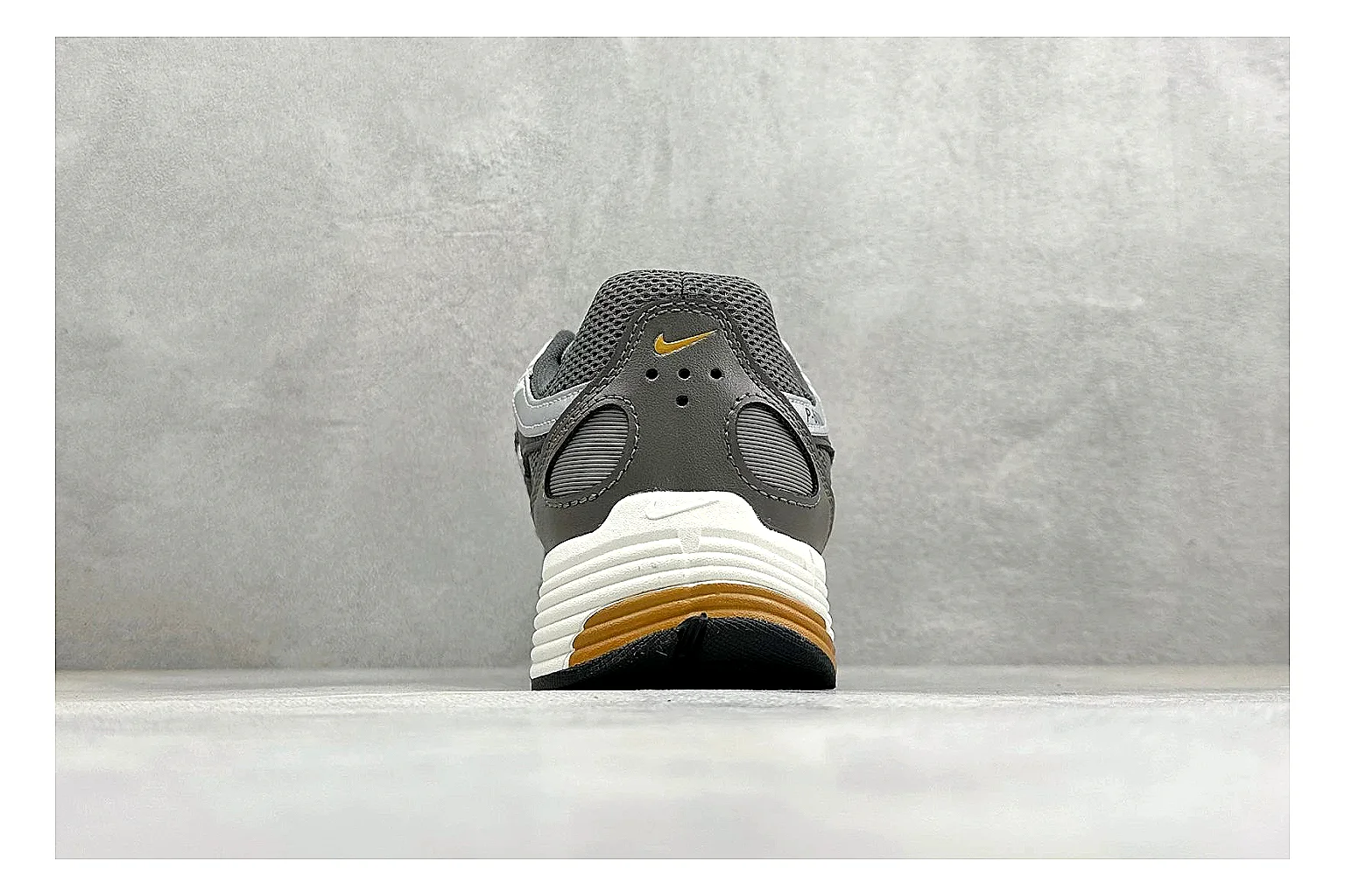 Nike P-6000 Black Orange shopping brief photo showing black layered runner upper, orange accent hits, retro P-6000 paneling, and cushioned casual sole thumbnail 6