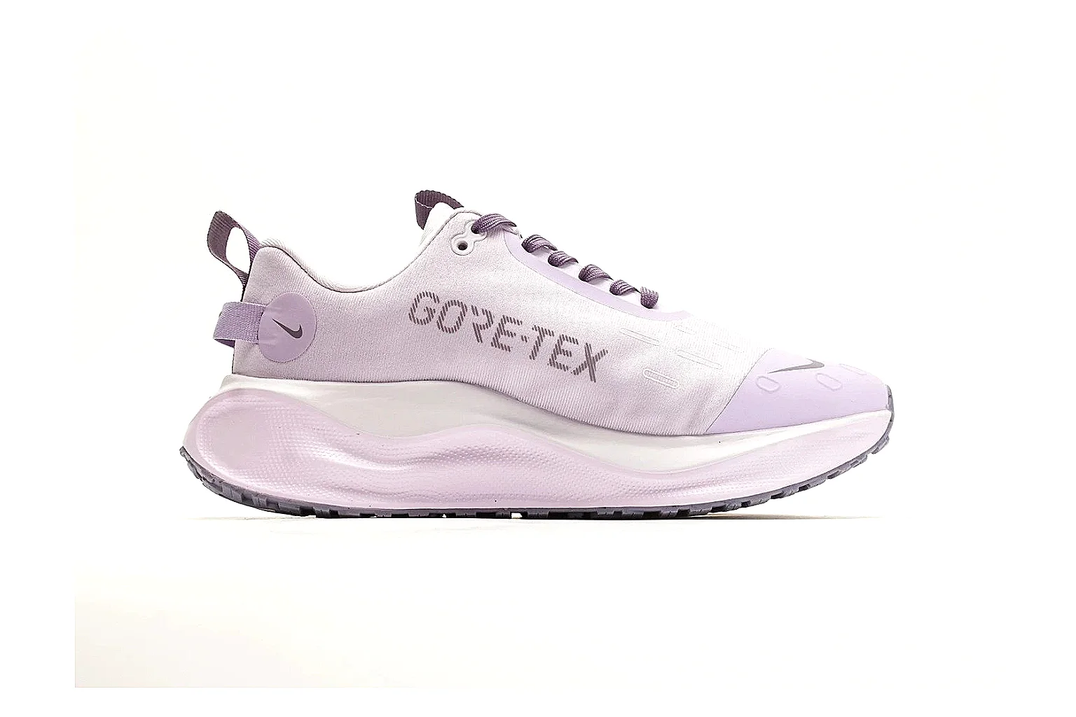 Nike ReactX GORE-TEX Lilac Sneakers shopping brief photo showing lilac textile upper, small Swoosh, heel pull tabs, cushioned ReactX-style sole, and weather-ready low profile thumbnail 4