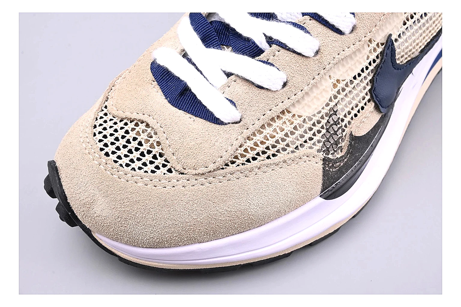 Nike Retro Runner Beige Blue shopping brief photo showing beige suede-mesh runner upper, blue accent panels, low retro profile, and cushioned running sole thumbnail 3
