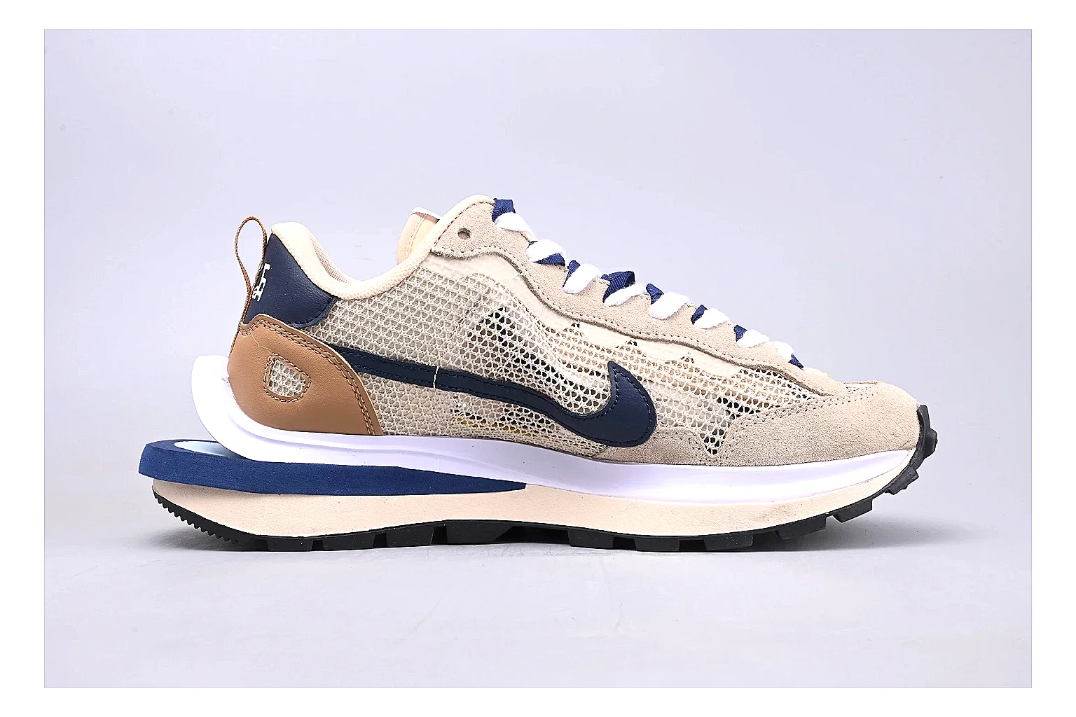 Nike Retro Runner Beige Blue shopping brief photo showing beige suede-mesh runner upper, blue accent panels, low retro profile, and cushioned running sole thumbnail 4