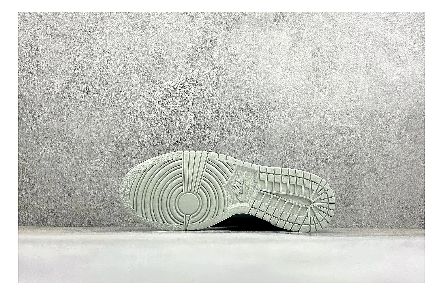 Nike SB Dunk Low Grey shopping brief photo showing grey low-top skate upper, white Swoosh, padded collar, and classic Dunk sole thumbnail 2