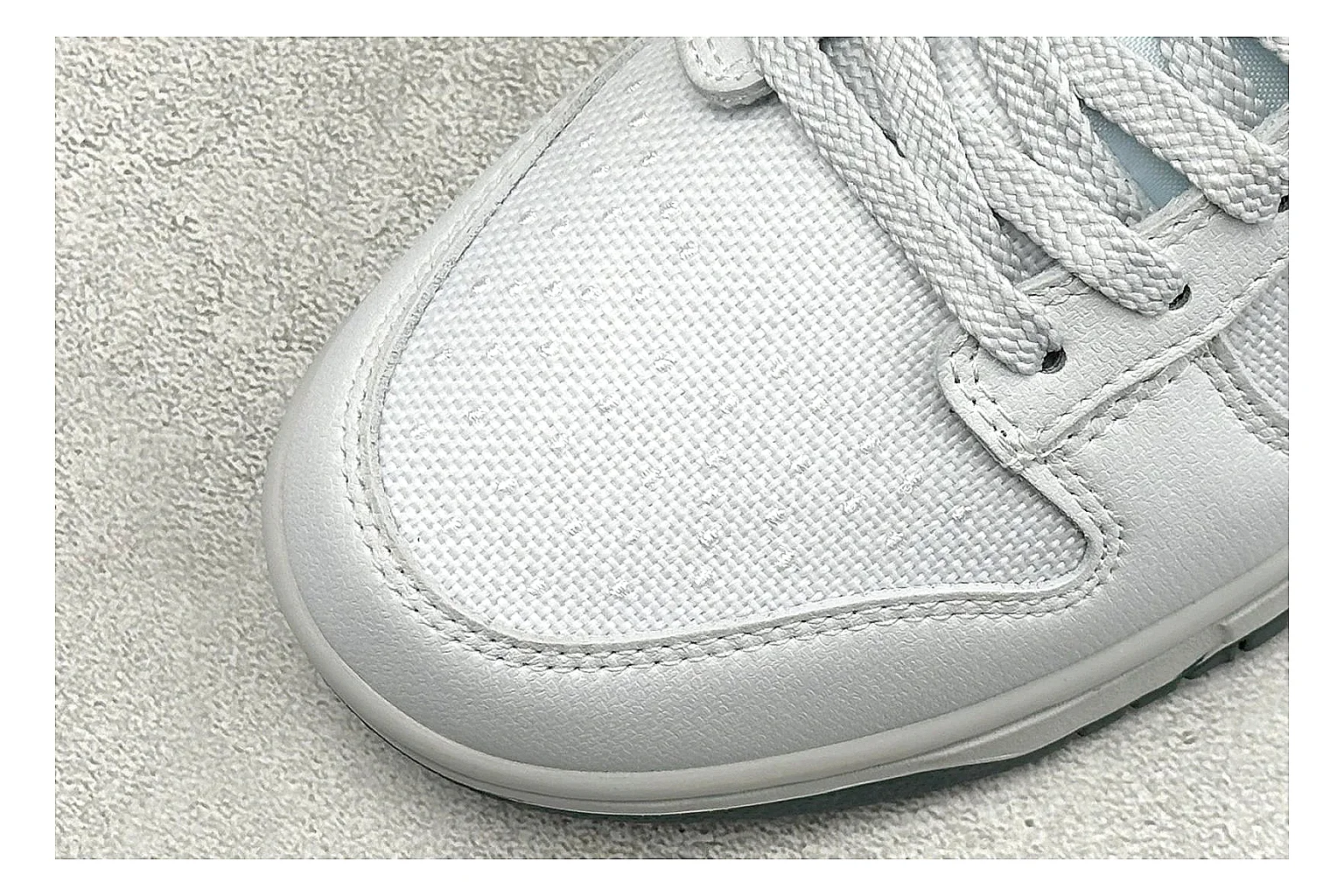 Nike SB Dunk Low White Green shopping brief photo showing white low-top skate upper, green Swoosh, padded collar, and classic Dunk sole shape thumbnail 3