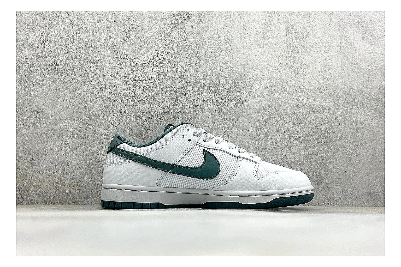 Nike SB Dunk Low White Green shopping brief photo showing white low-top skate upper, green Swoosh, padded collar, and classic Dunk sole shape thumbnail 4