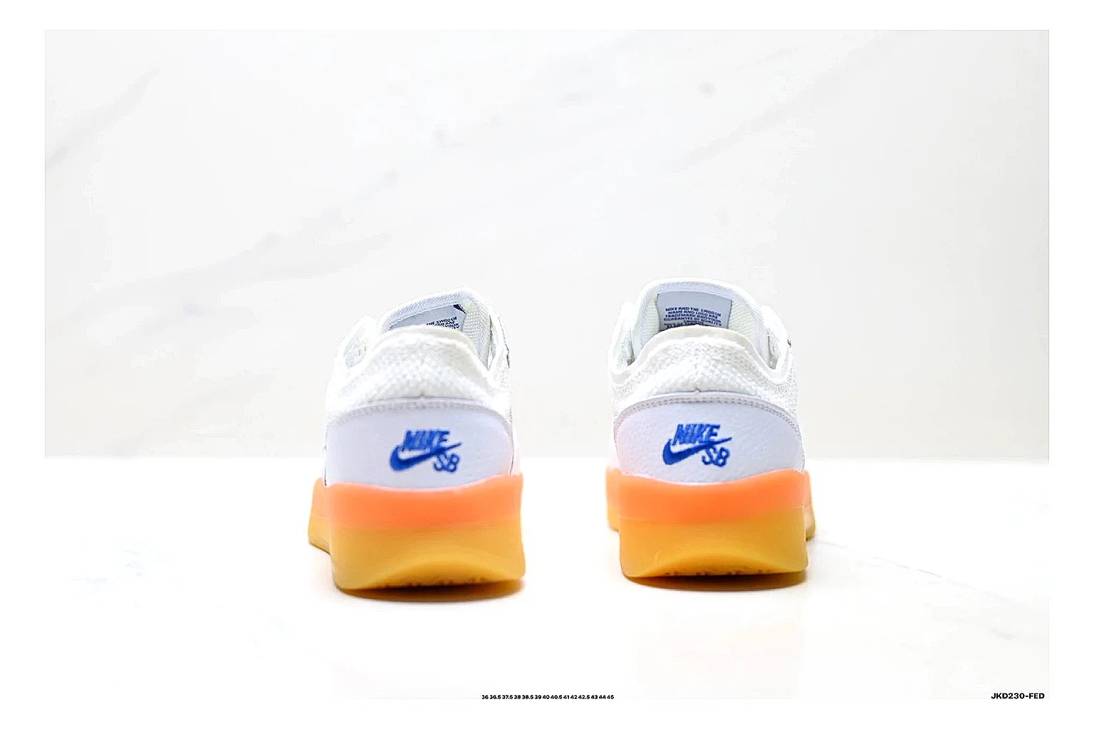 Nike SB PS8 White Blue Sneakers shopping brief image showing white blue skate sneakers with leather texture, side-profile shape, upper panel lines, and outsole detail thumbnail 6