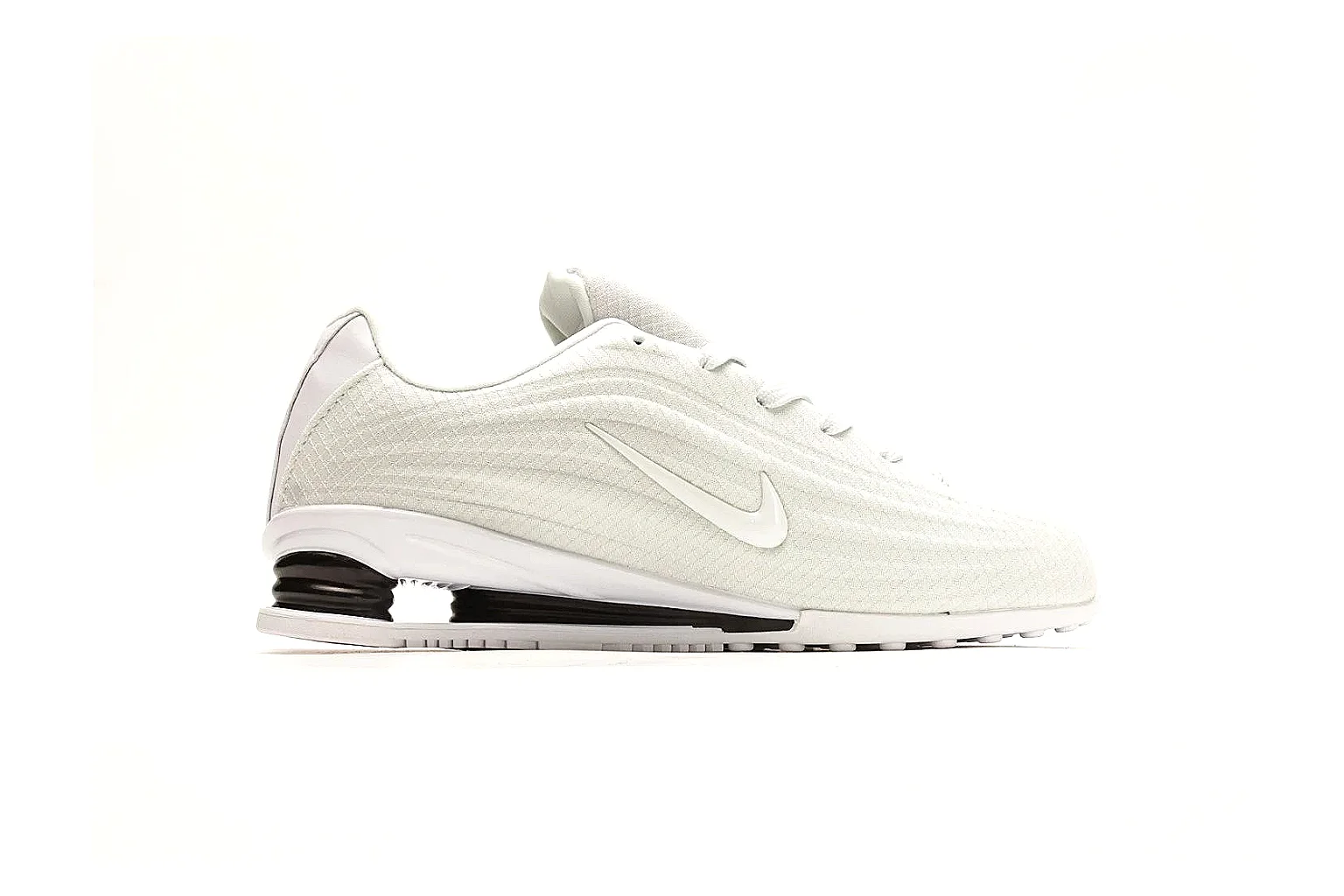 Nike Shox Z White Sneakers shopping brief photo showing white streamlined layered upper, small Swoosh, black heel cushioning columns, and modern low runner shape thumbnail 4