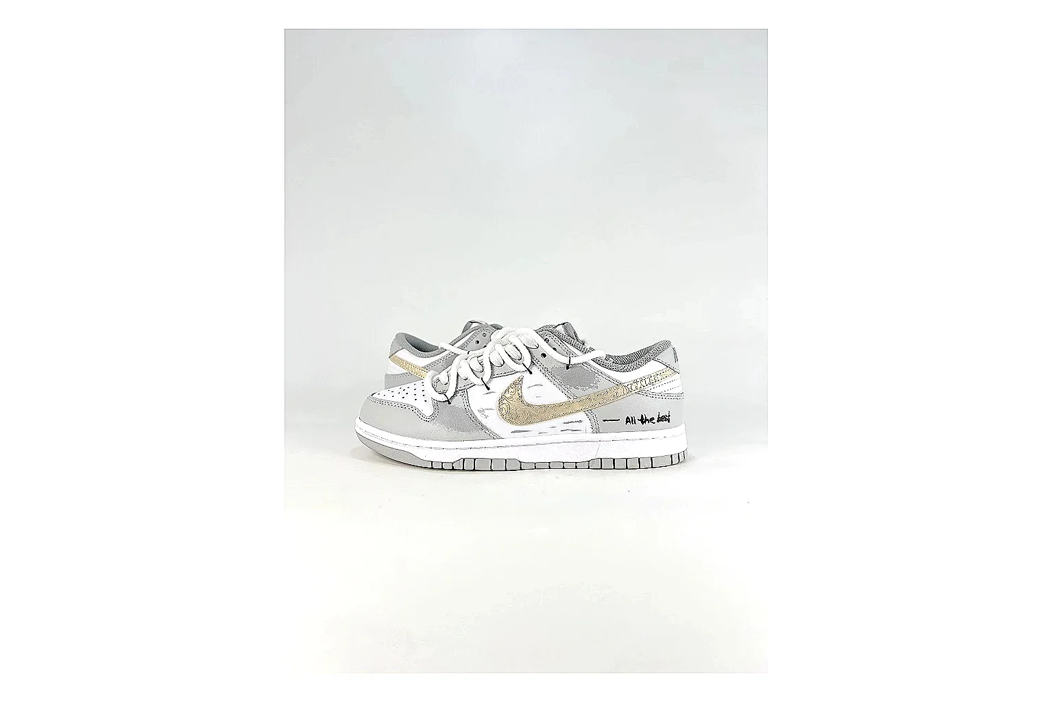 Nike Silver Runner Silver Gold shopping brief photo showing silver synthetic-mesh upper, gold accent details, modern runner shape, and cushioned sole thumbnail 4