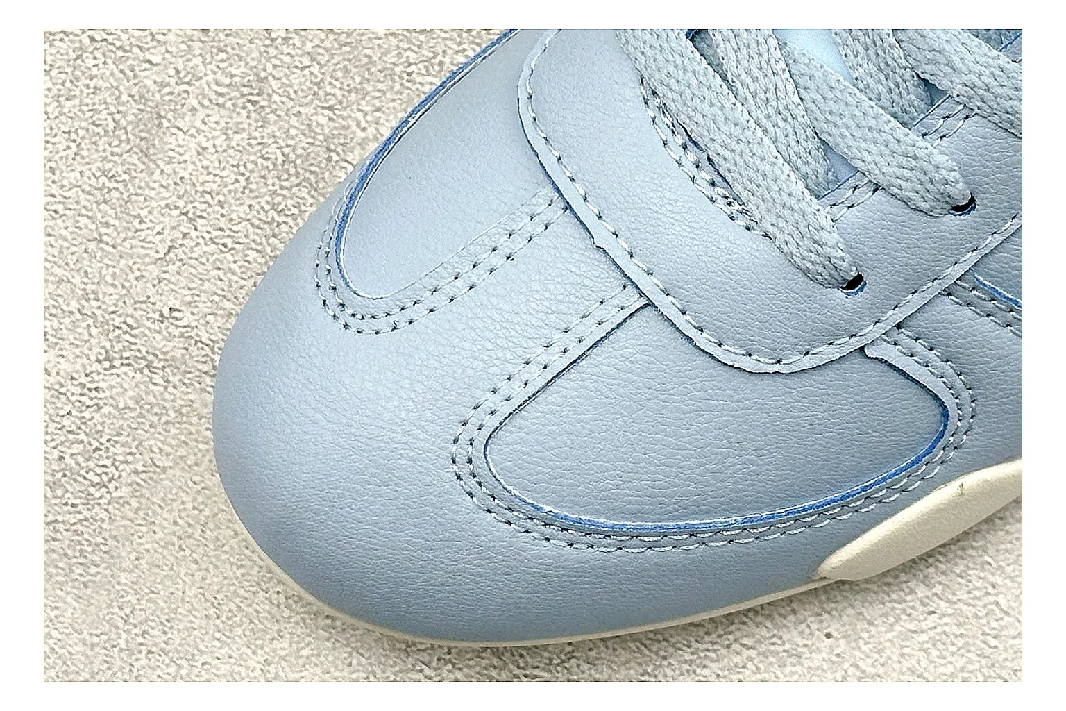 Nike Sprint Sister Light Blue shopping brief photo showing light blue retro-runner upper, slim side profile, tonal panels, and low everyday sole thumbnail 3