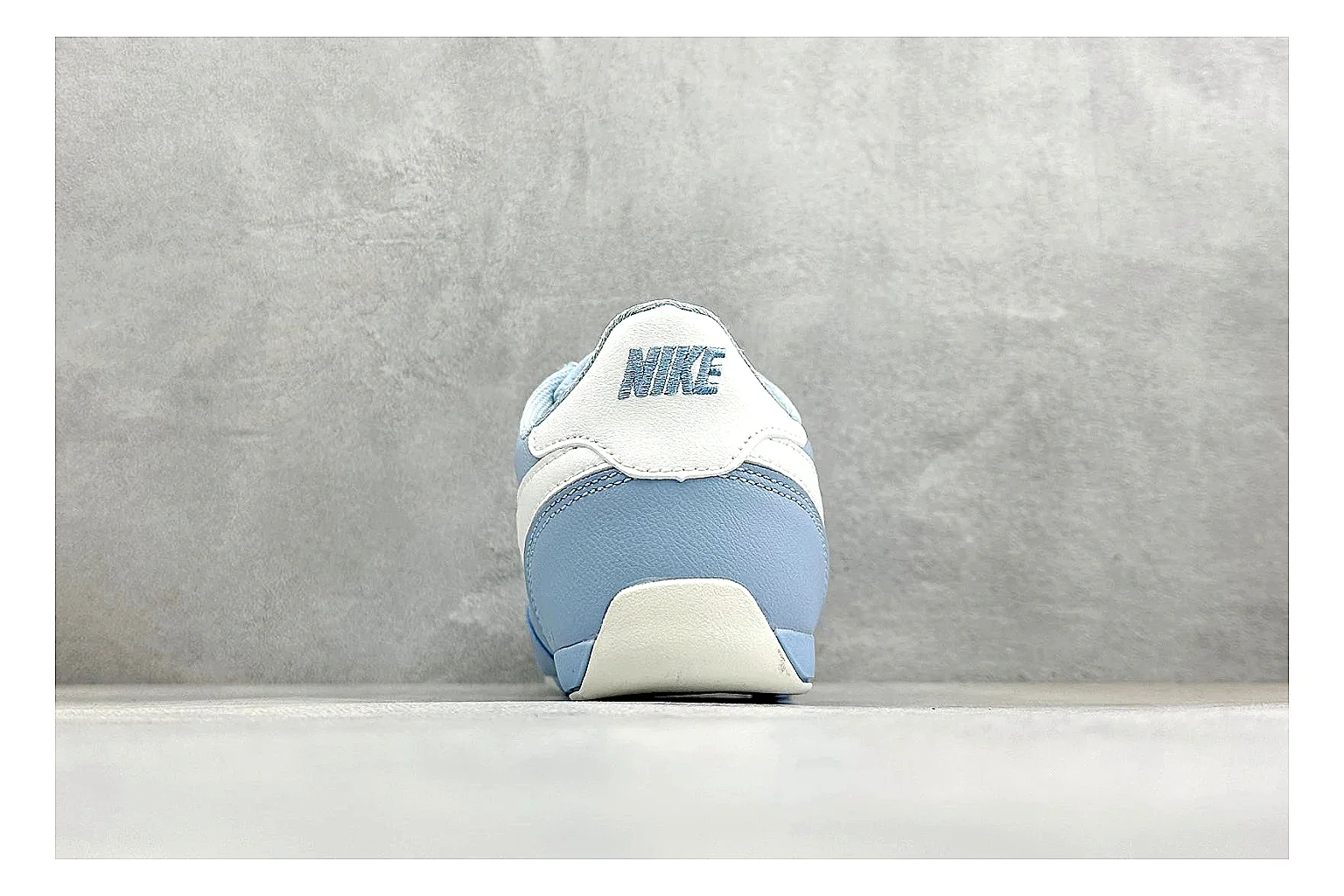 Nike Sprint Sister Light Blue shopping brief photo showing light blue retro-runner upper, slim side profile, tonal panels, and low everyday sole thumbnail 6