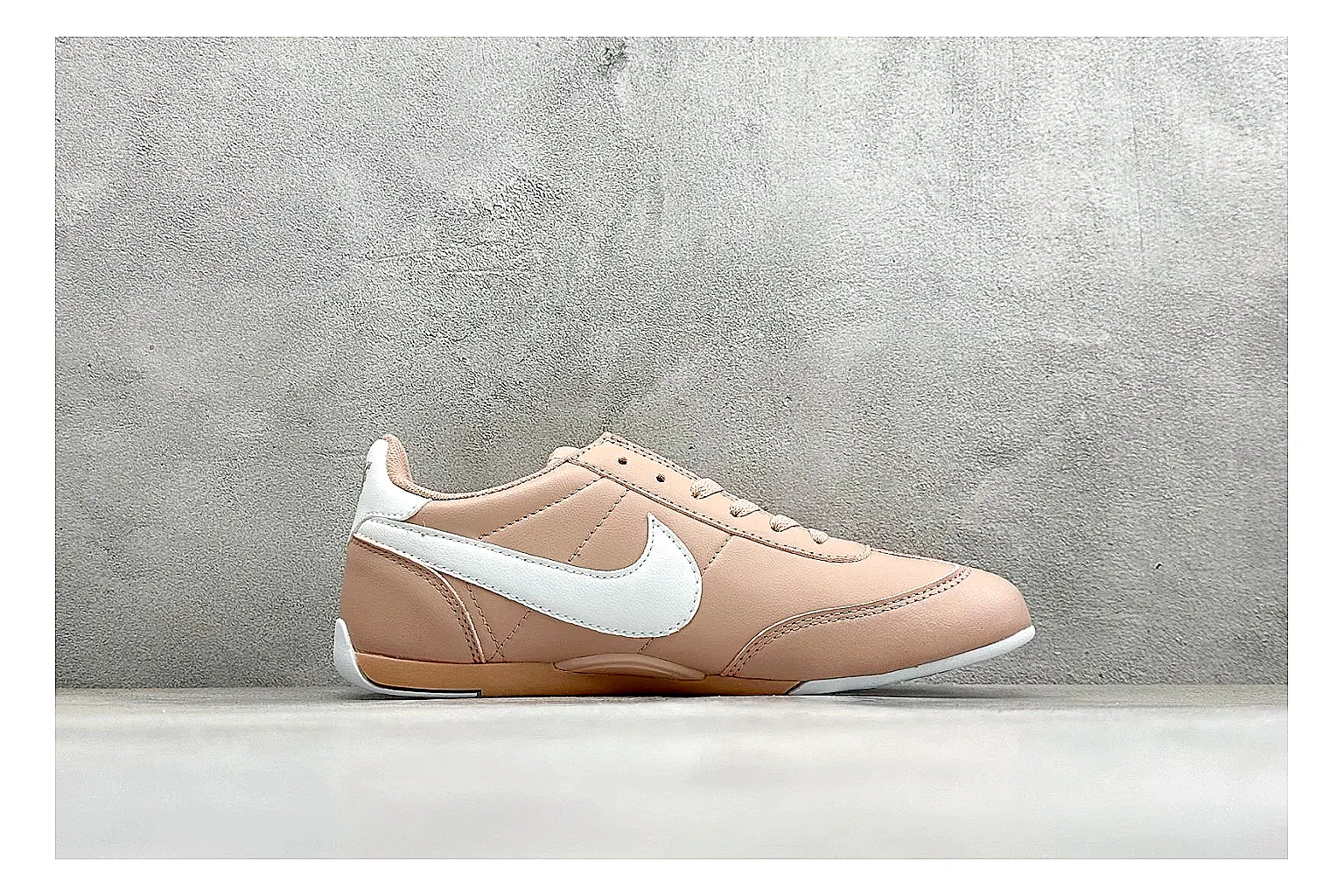 Nike Sprint Sister Pink shopping brief photo showing soft pink retro-runner upper, slim side profile, low collar, and light casual sole thumbnail 4