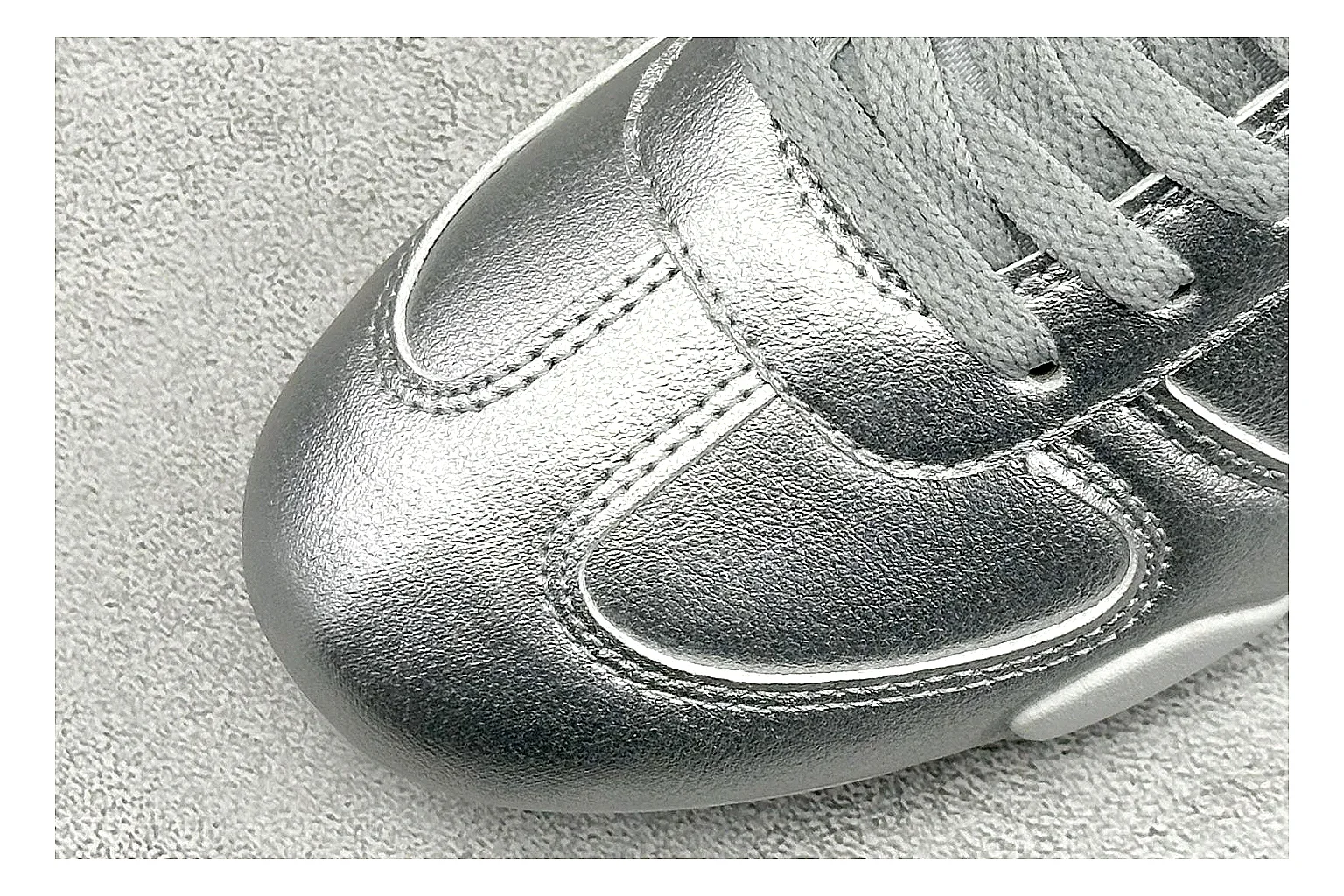 Nike Sprint Sister Silver shopping brief photo showing silver retro-runner upper, slim low-top shape, layered side panels, and a light everyday sole thumbnail 3