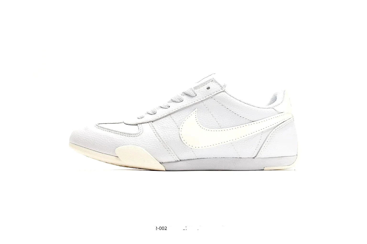 Nike Sprint White Cream Sneakers shopping brief image showing white cream low-top sneakers with leather texture, side-profile shape, upper panel lines, and outsole detail