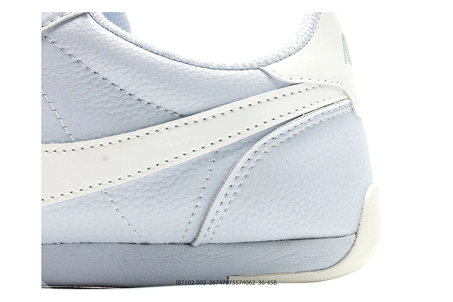 Nike Sprint White Cream Sneakers shopping brief image showing white cream low-top sneakers with leather texture, side-profile shape, upper panel lines, and outsole detail thumbnail 3