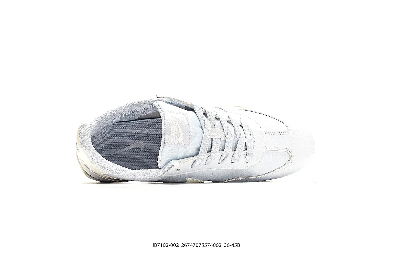 Nike Sprint White Cream Sneakers shopping brief image showing white cream low-top sneakers with leather texture, side-profile shape, upper panel lines, and outsole detail thumbnail 5