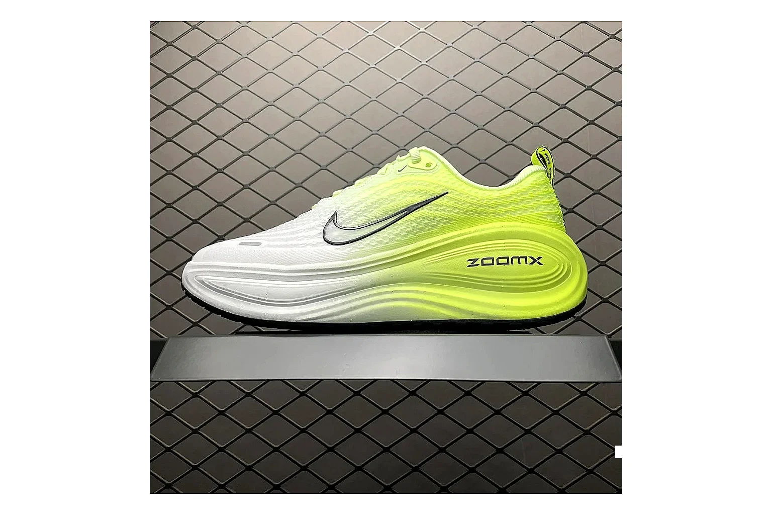 Nike Vomero Plus Volt White shopping brief image showing white volt vomero plus runner with mixed upper and runner shape