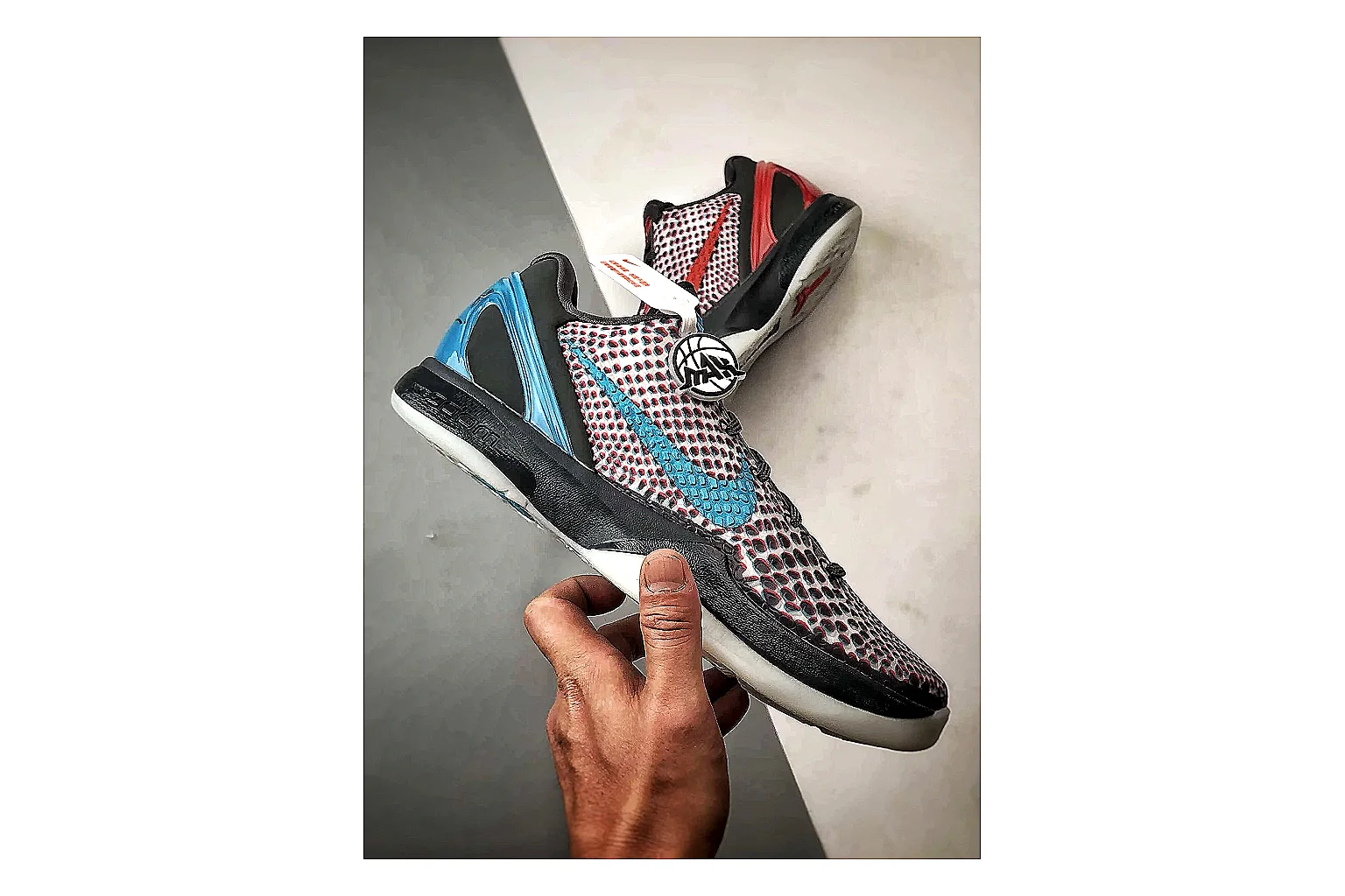 Nike Woven Runner Gray Teal shopping brief photo showing gray woven-mesh runner upper, teal accent details, modern runner shape, and cushioned sole thumbnail 2
