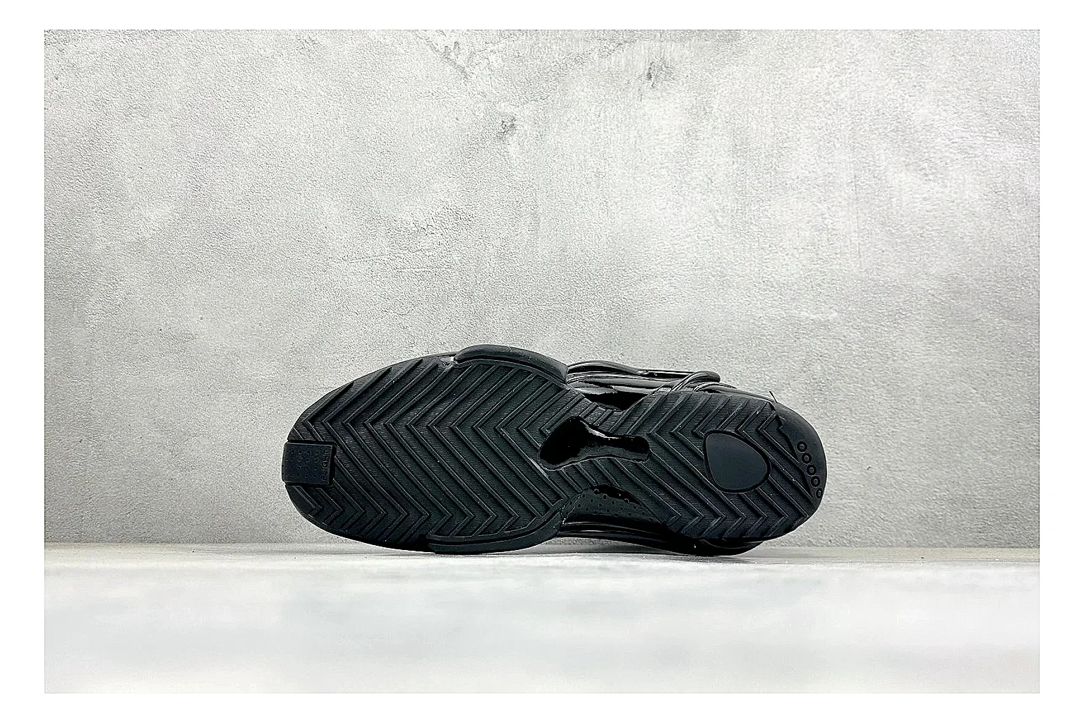 Nike Zoom Hyperflight Black shopping brief photo showing glossy black basketball upper, sleek shell shape, subtle Swoosh detail, and sculpted court sole thumbnail 2