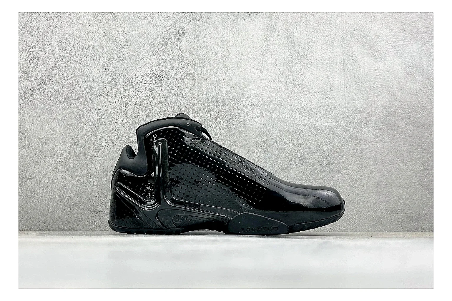 Nike Zoom Hyperflight Black shopping brief photo showing glossy black basketball upper, sleek shell shape, subtle Swoosh detail, and sculpted court sole thumbnail 4