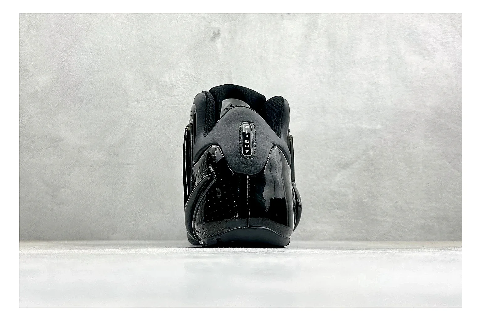 Nike Zoom Hyperflight Black shopping brief photo showing glossy black basketball upper, sleek shell shape, subtle Swoosh detail, and sculpted court sole thumbnail 6