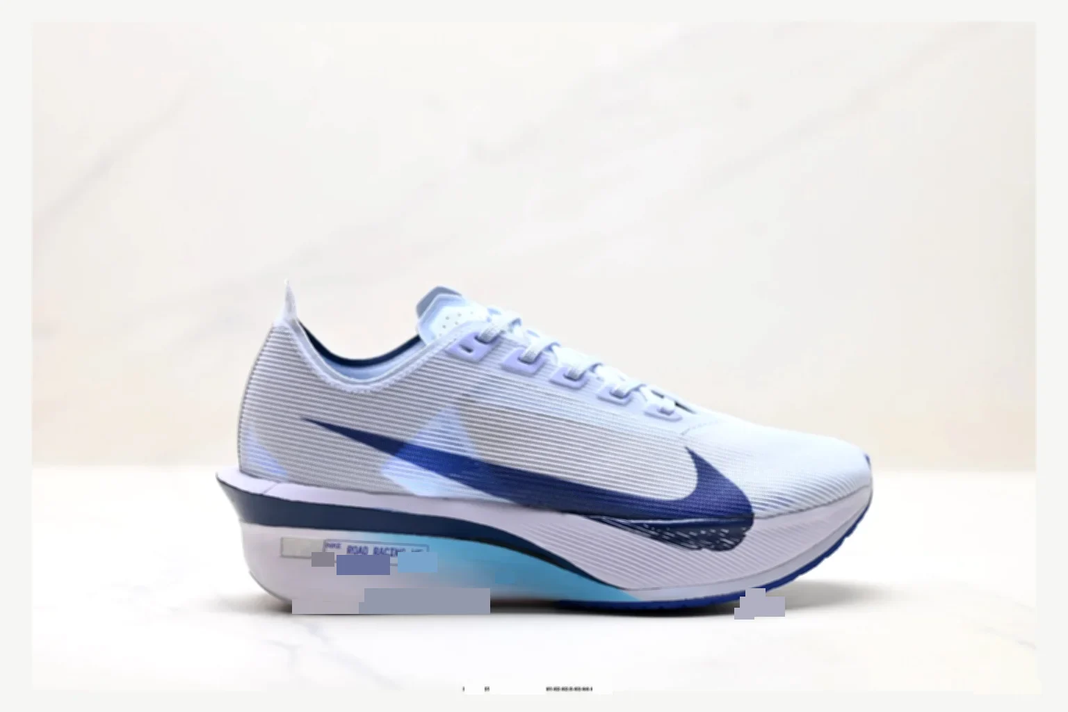 Nike ZoomX Vapor White Blue Runner shopping brief image SKU 1182167428