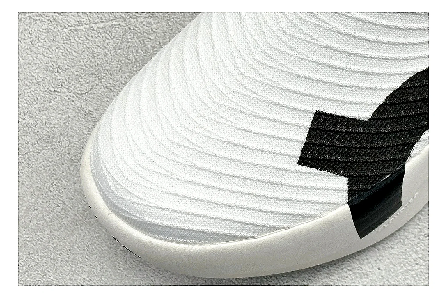 On Cloudboom White Black shopping brief photo showing white performance mesh, black contrast details, slim racing profile, and segmented CloudTec sole thumbnail 3