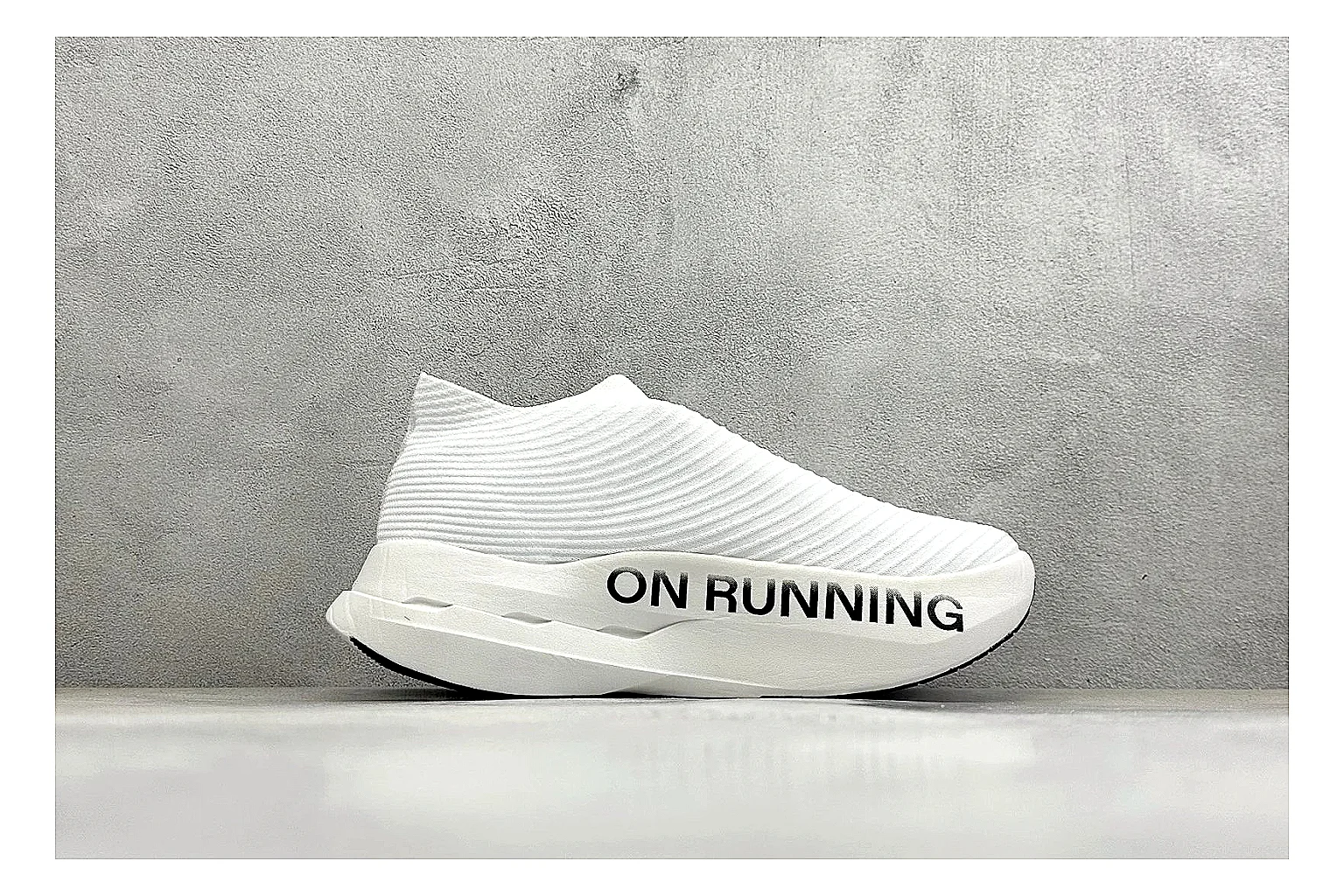 On Cloudboom White Black shopping brief photo showing white performance mesh, black contrast details, slim racing profile, and segmented CloudTec sole thumbnail 4