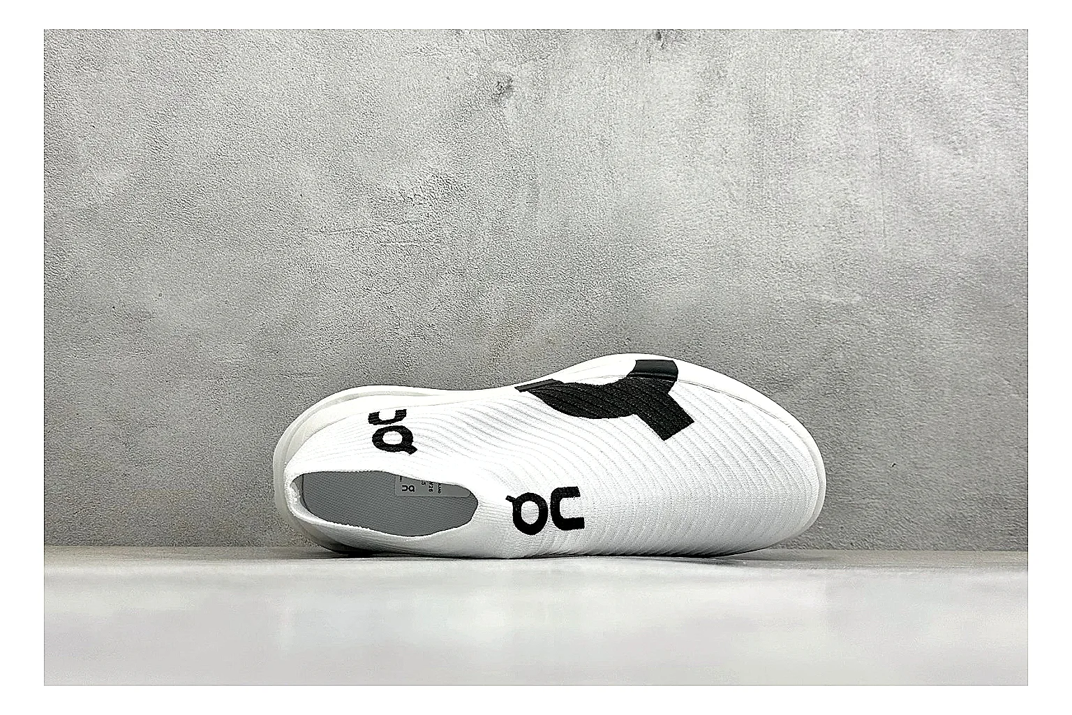 On Cloudboom White Black shopping brief photo showing white performance mesh, black contrast details, slim racing profile, and segmented CloudTec sole thumbnail 5