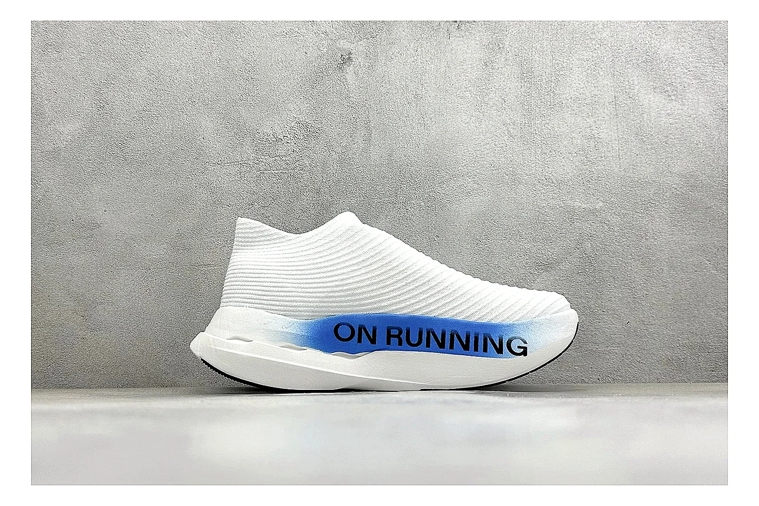On Cloudboom White Blue shopping brief photo showing white performance mesh, blue gradient accents, slim racing profile, and segmented CloudTec sole thumbnail 4
