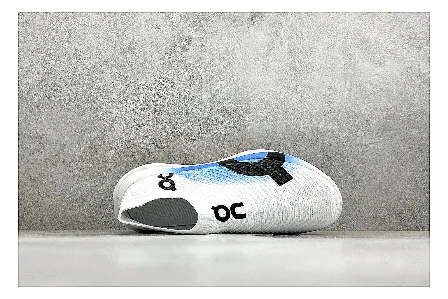 On Cloudboom White Blue shopping brief photo showing white performance mesh, blue gradient accents, slim racing profile, and segmented CloudTec sole thumbnail 5