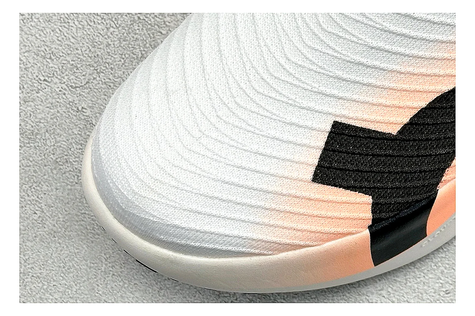 On Cloudboom White Peach shopping brief photo showing white performance mesh, peach gradient accents, slim racing profile, and segmented CloudTec sole thumbnail 3