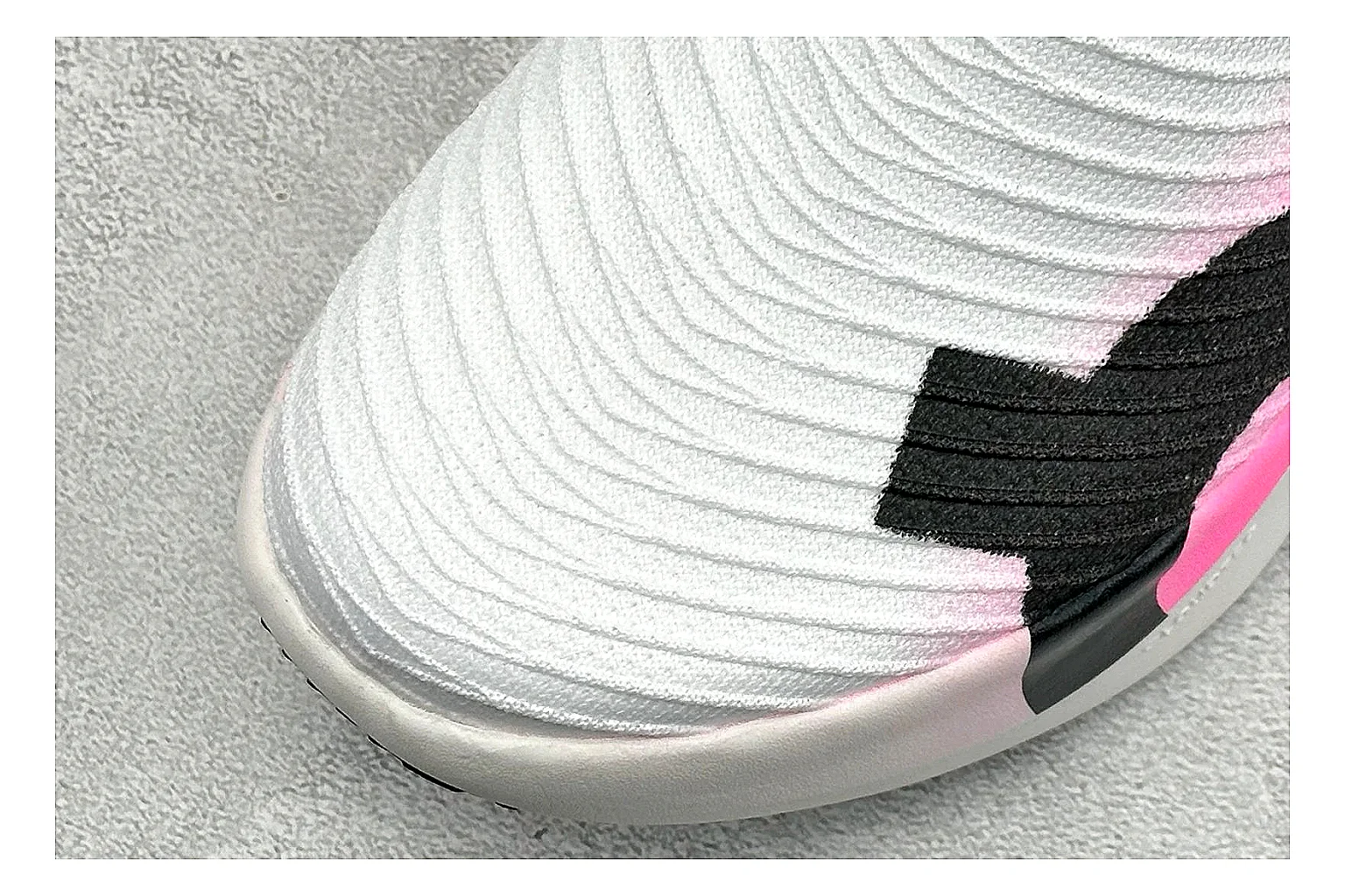 On Cloudboom White Pink shopping brief photo showing white running mesh, pink gradient accents, low racing shape, and segmented CloudTec sole thumbnail 3