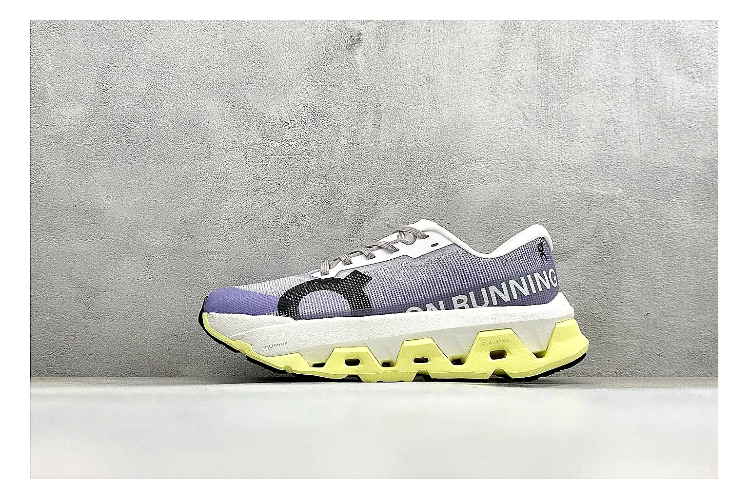 On Cloudmonster Lavender Lime shopping brief photo showing lavender runner upper, lime accent hits, oversized CloudTec pod sole, and soft technical color mix