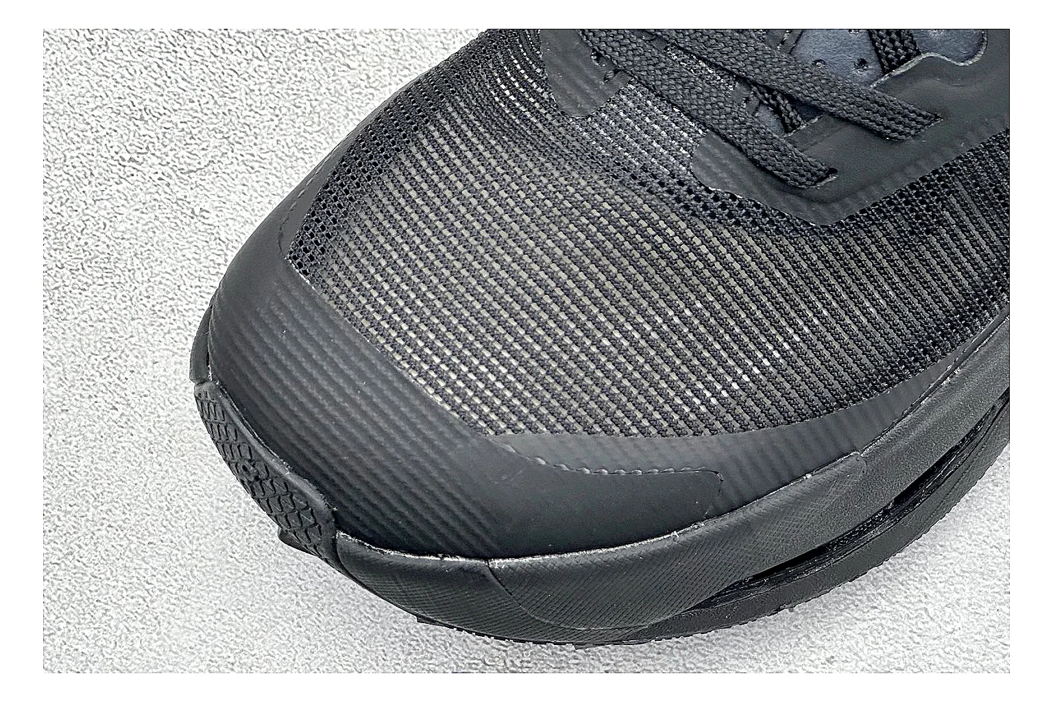 On Cloudmonster Triple Black shopping brief photo showing triple black mesh upper, oversized CloudTec sole pods, tonal laces, and rounded runner shape thumbnail 3